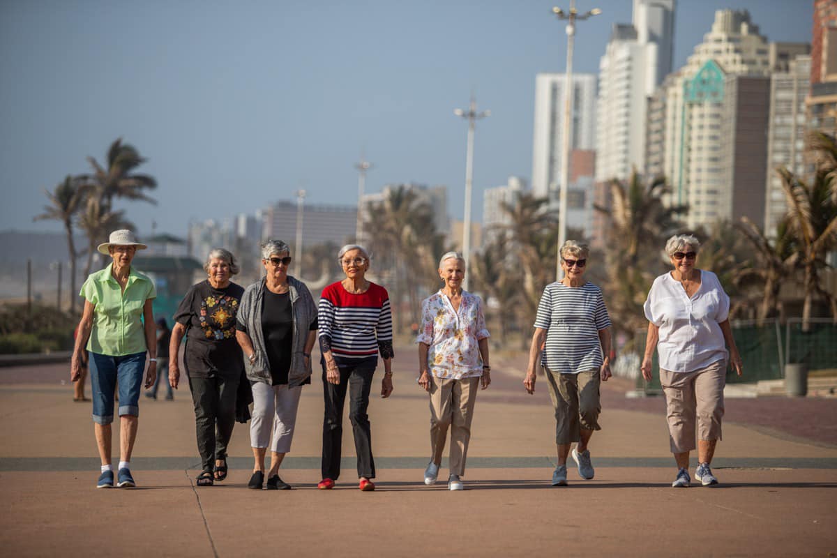Residents Enjoying Durban's Golden Mile near Edenroc Retirement Village
